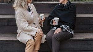 Family member having a calm, serious conversation with a loved one about their drinking.