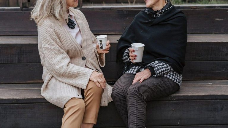 Family member having a calm, serious conversation with a loved one about their drinking.