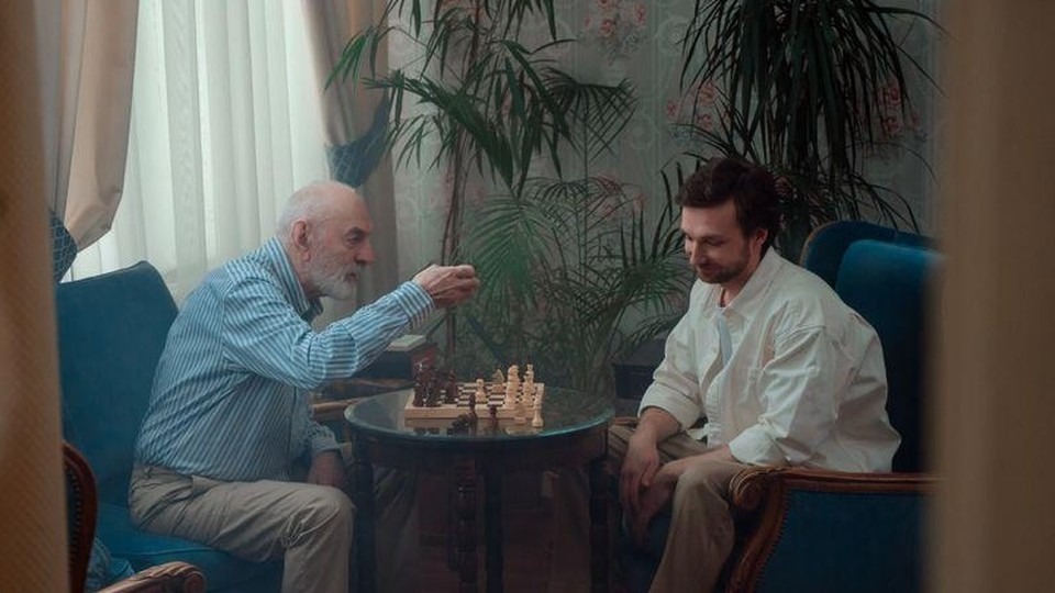 Parent talking with his adult son about behavioral changes he has noticed