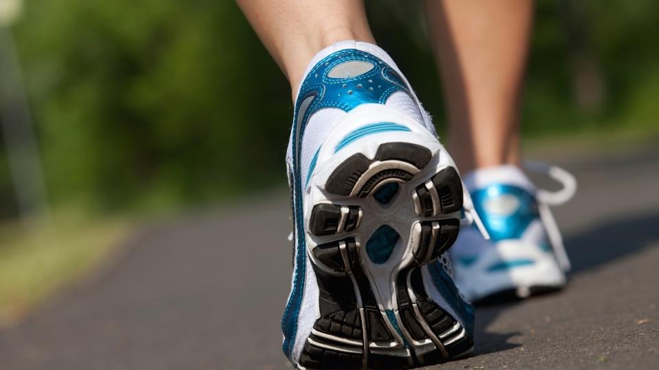 Replacing Addiction with Exercise is a healthy mindset this woman is enjoying while exercising her arms.