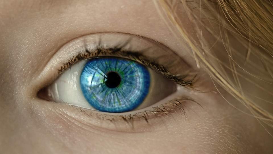 What Is EMDR Therapy a woman gets her eyes examined by a therapy provider.