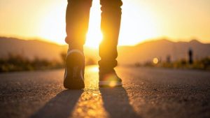 What Happens After IOP Treatment hero image of a man walking into the sunset.